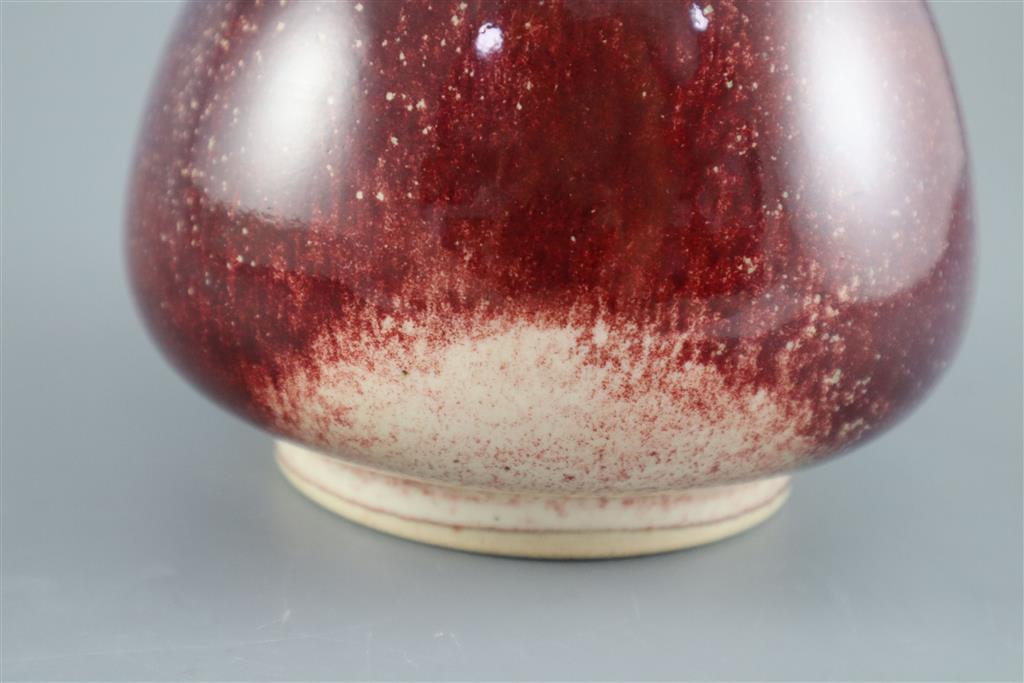 A Ruskin high fired flambe glazed vase, dated 1911, 22cm high